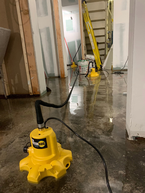 Extracting water from a flooded basement.