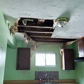 Damaged kitchen ceiling due to water leak.