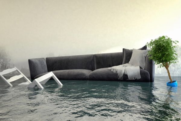 Couch and chair floating in flood