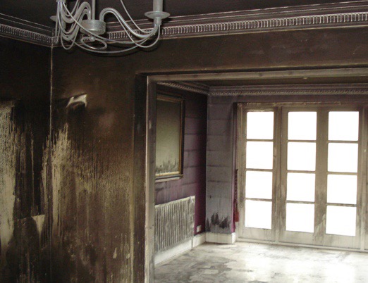 A smoke damaged room after a fire.